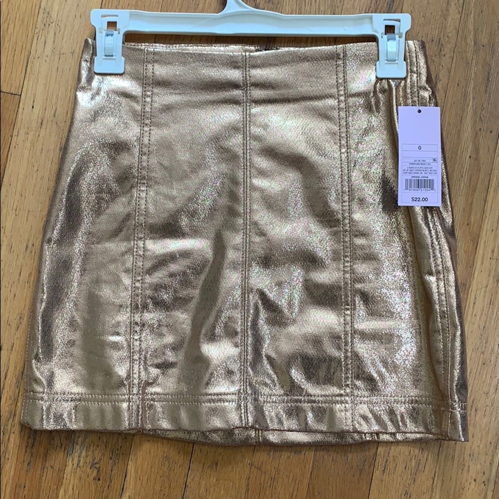 Gold mini skirt! Never worn with tags still on!
